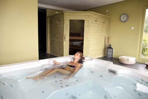 Young woman relaxing in spa